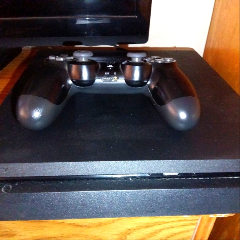 Sony PlayStation Console with Black Controller